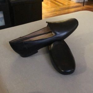 Black flat comfy Naturalizer shoes.